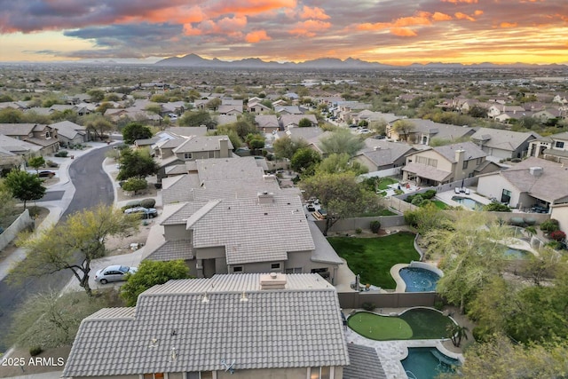 birds eye view of property with a residential view and a mountain view