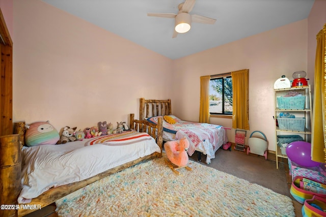 carpeted bedroom with a ceiling fan