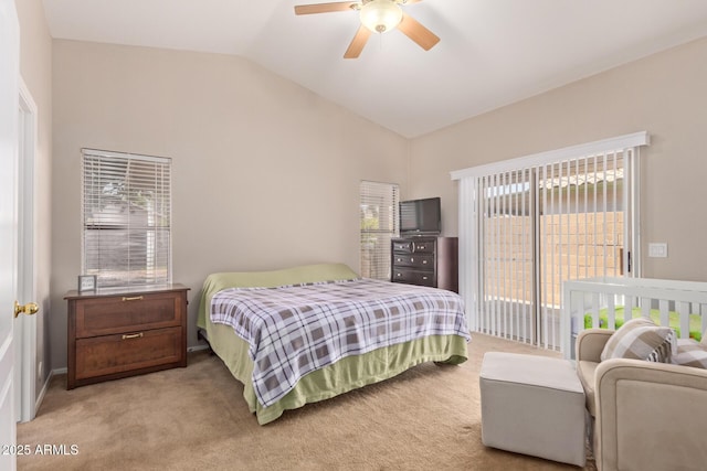 bedroom featuring light carpet, lofted ceiling, ceiling fan, and access to outside