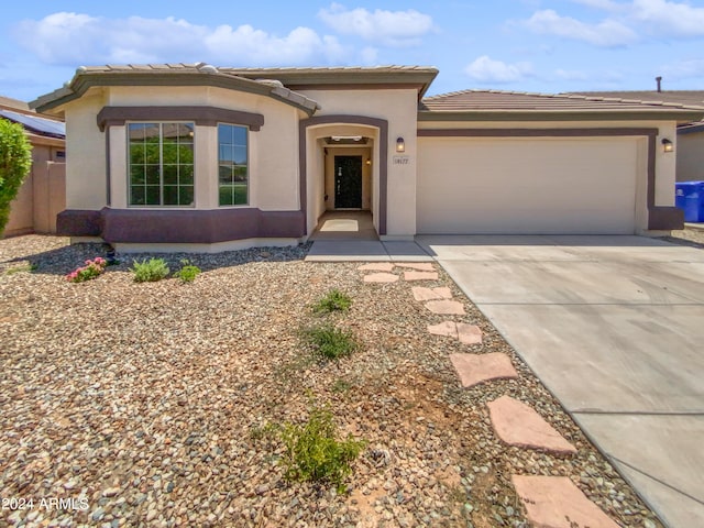 view of front of home with a garage