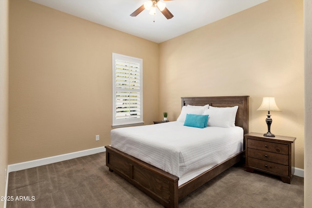 bedroom with ceiling fan, baseboards, and carpet