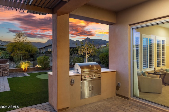 entryway featuring brick floor and a mountain view