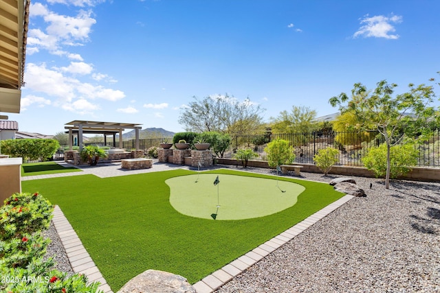 view of yard featuring a patio area, an outdoor fire pit, a fenced backyard, and a pergola