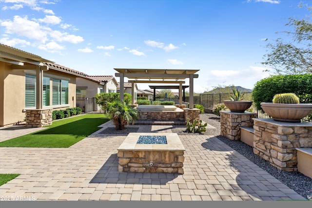 view of patio with a fire pit and a fenced backyard