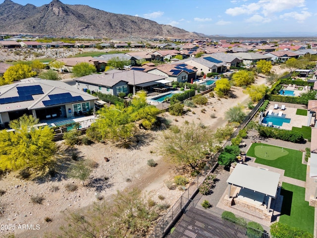 aerial view with a mountain view and a residential view