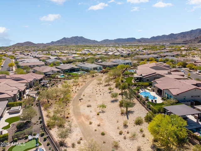 drone / aerial view with a mountain view and a residential view