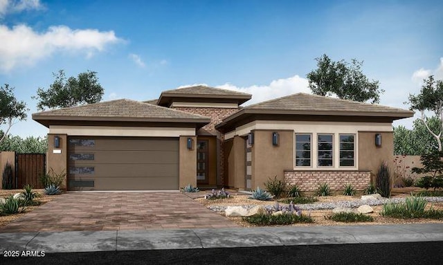 prairie-style home with a garage