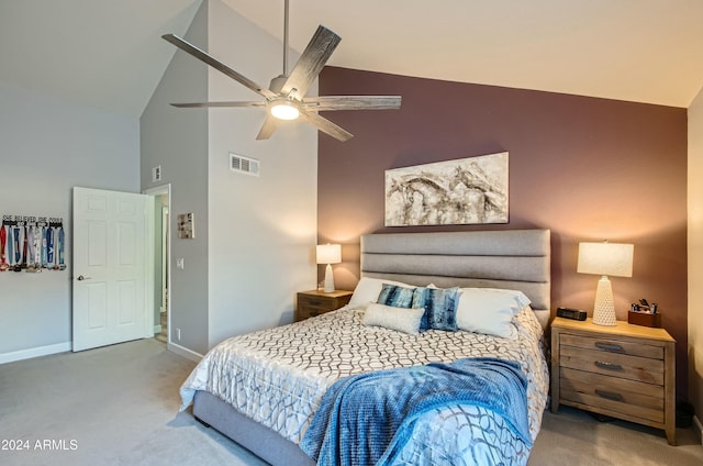 carpeted bedroom featuring ceiling fan and high vaulted ceiling