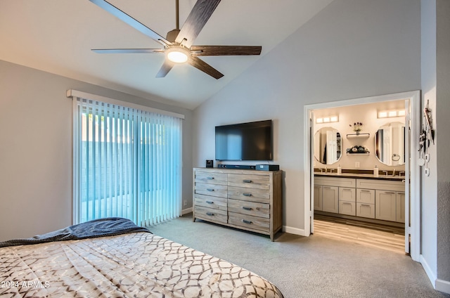 bedroom featuring connected bathroom, high vaulted ceiling, light colored carpet, ceiling fan, and sink