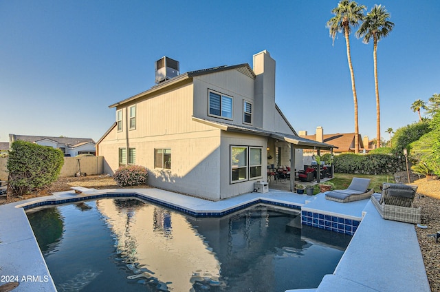 view of pool featuring a patio area