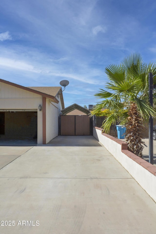 3519 W Libby St, Glendale, AZ 85308 - view of property exterior with concrete driveway and a garage