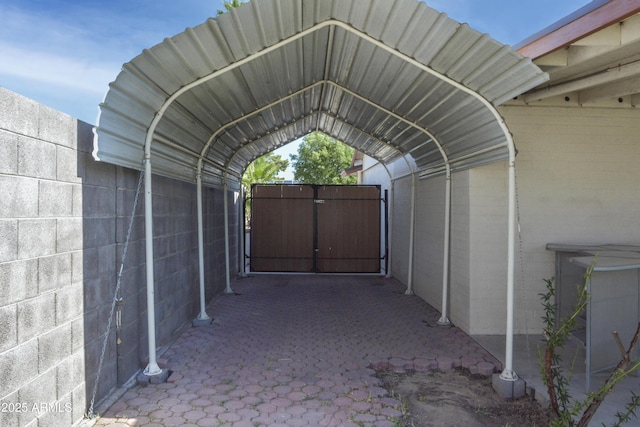 3519 W Libby St, Glendale, AZ 85308 - view of parking featuring a detached carport and a gate