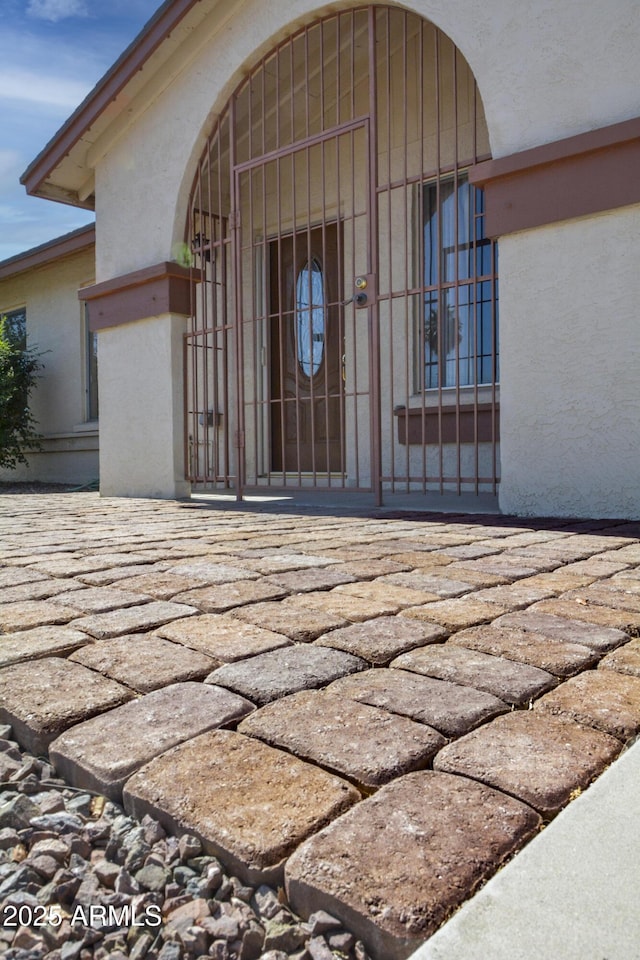 3519 W Libby St, Glendale, AZ 85308 - entrance to property featuring a gate and stucco siding