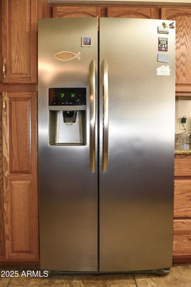 3519 W Libby St, Glendale, AZ 85308 - kitchen view of stainless steel refrigerator with ice dispenser and brown cabinets