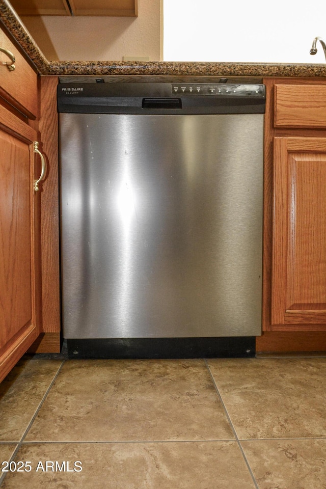 3519 W Libby St, Glendale, AZ 85308 - kitchen view of stainless steel dishwasher and brown cabinetry