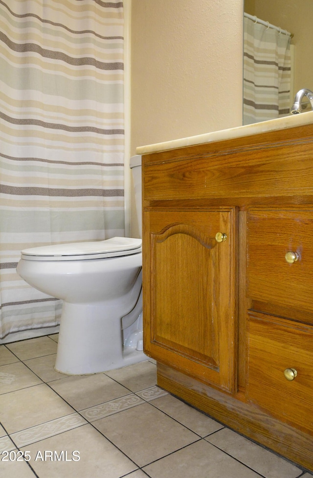 3519 W Libby St, Glendale, AZ 85308 - bathroom with vanity, tile patterned floors, toilet, and a shower with shower curtain