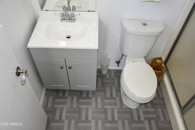 3519 W Libby St, Glendale, AZ 85308 - bathroom with vanity, toilet, and baseboards