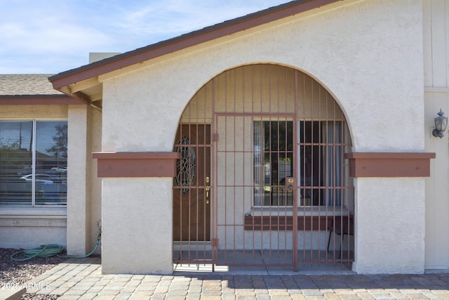 3519 W Libby St, Glendale, AZ 85308 - entrance to property with a gate and stucco siding