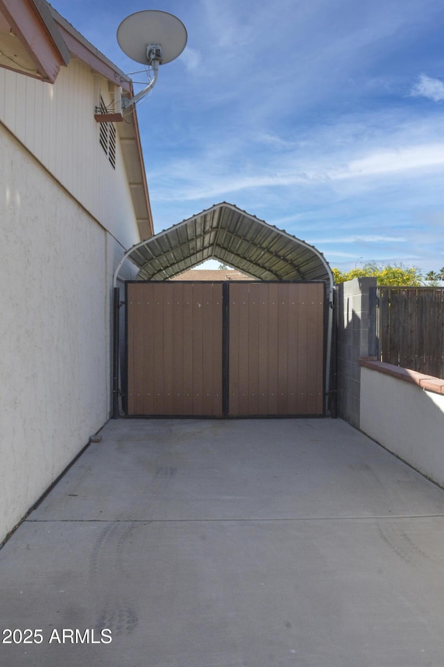 3519 W Libby St, Glendale, AZ 85308 - view of patio with a gate and a carport