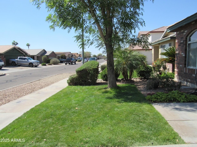 view of yard with a residential view