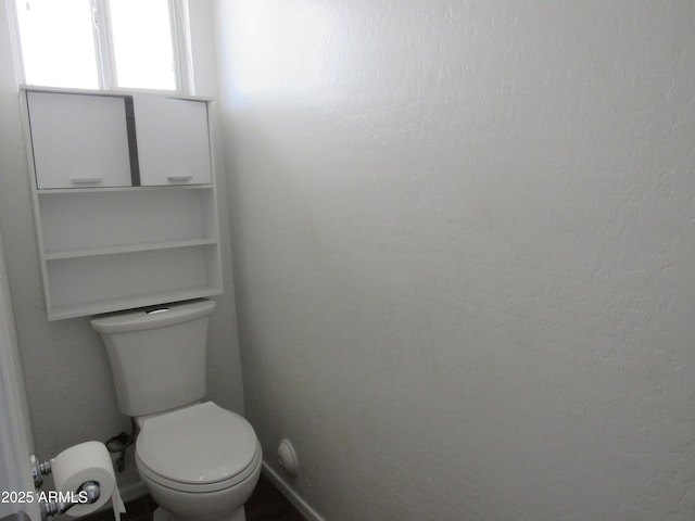 bathroom featuring toilet