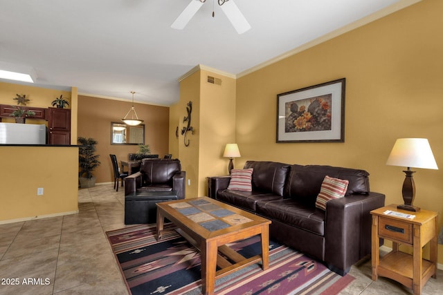 5335 E Shea Blvd Unit 1094, Scottsdale, AZ 85254 - living room with ornamental molding, a ceiling fan, light tile patterned floors, and baseboards