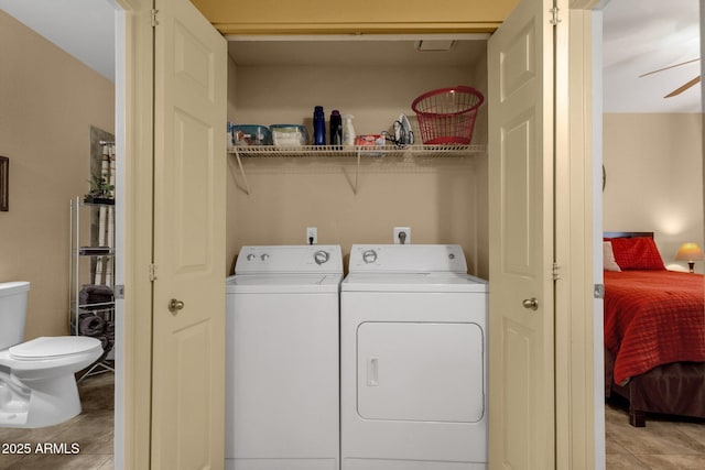 5335 E Shea Blvd Unit 1094, Scottsdale, AZ 85254 - laundry area featuring washer and clothes dryer, light tile patterned floors, and ceiling fan
