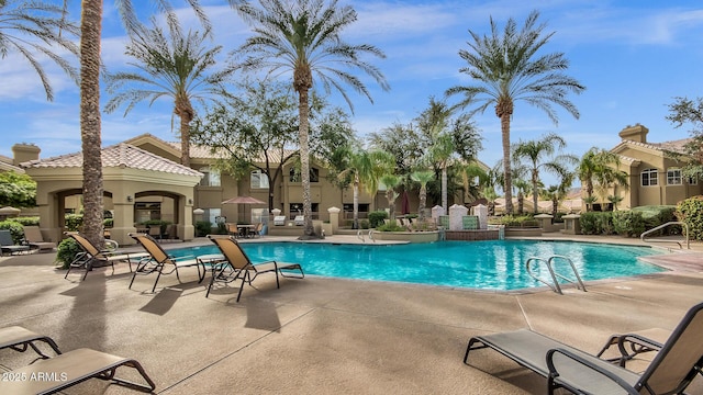 5335 E Shea Blvd Unit 1094, Scottsdale, AZ 85254 - community pool featuring a patio