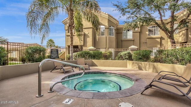 5335 E Shea Blvd Unit 1094, Scottsdale, AZ 85254 - view of pool featuring a community hot tub and a patio area