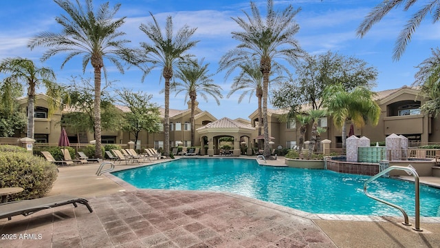 5335 E Shea Blvd Unit 1094, Scottsdale, AZ 85254 - community pool with a patio area and a residential view