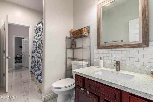 205 N 107th Dr, Avondale, AZ 85323 - full bath with vanity, marble look tile flooring, decorative backsplash, and curtained shower