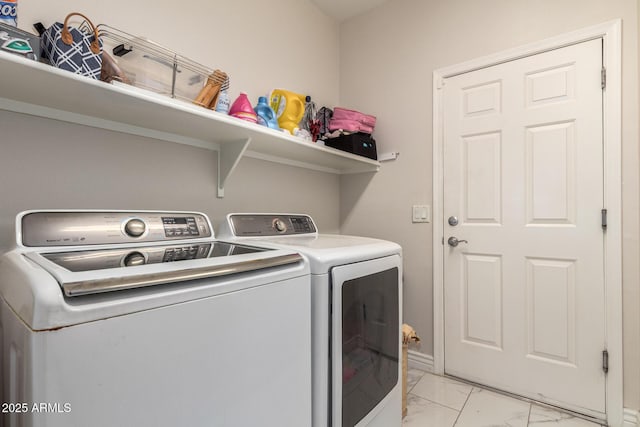 205 N 107th Dr, Avondale, AZ 85323 - laundry area with light marble finish floors and separate washer and dryer