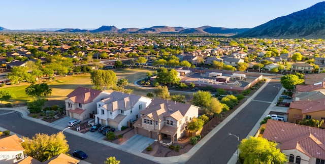 aerial view featuring a mountain view and a residential view