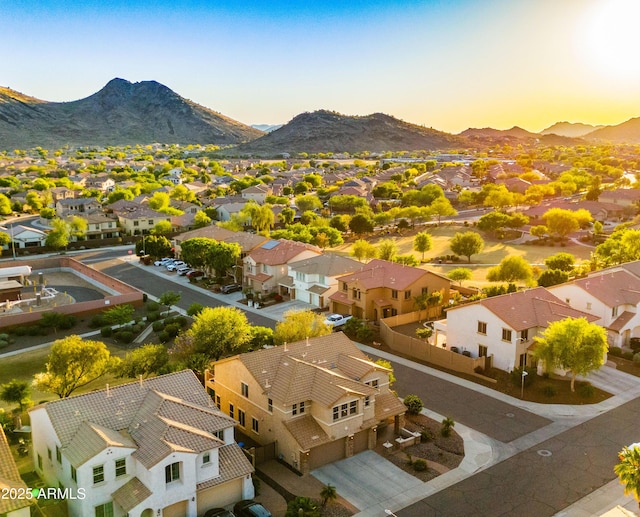 aerial view featuring a residential view and a mountain view