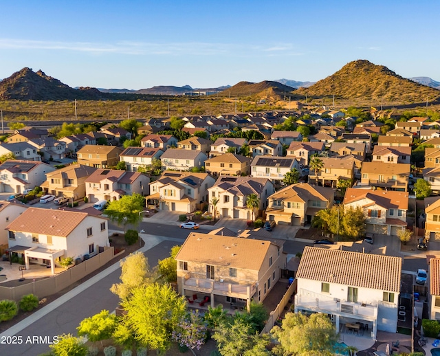 bird's eye view featuring a mountain view and a residential view