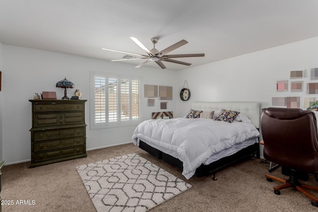 bedroom featuring carpet flooring, a ceiling fan, and baseboards