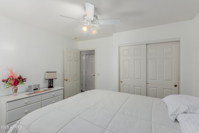 bedroom with a closet and ceiling fan