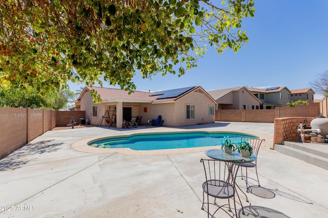 view of pool with a patio, a fenced backyard, and a fenced in pool