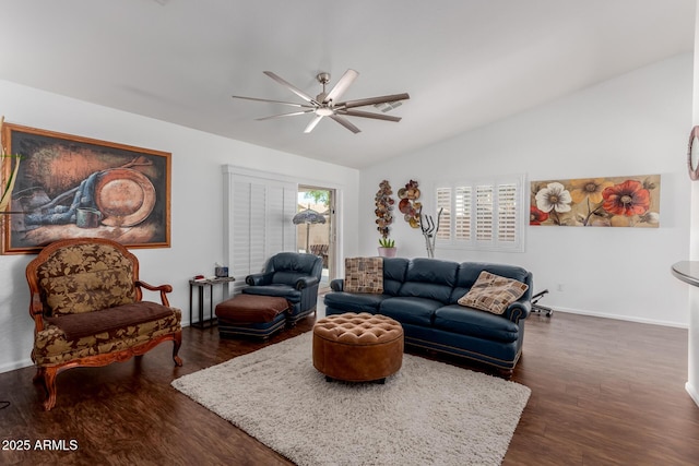 living room featuring a ceiling fan, vaulted ceiling, dark wood-style floors, and baseboards