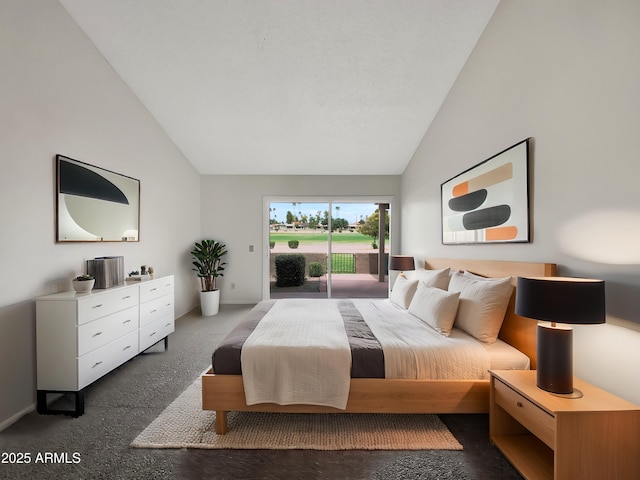bedroom featuring baseboards, access to exterior, and high vaulted ceiling