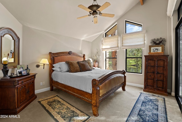 bedroom featuring ceiling fan, high vaulted ceiling, and light carpet