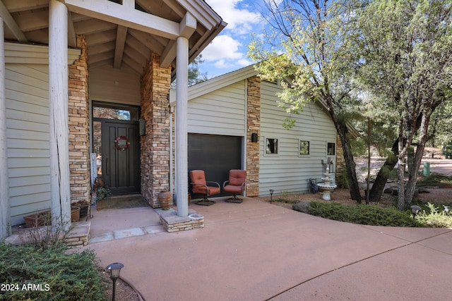 property entrance featuring a garage