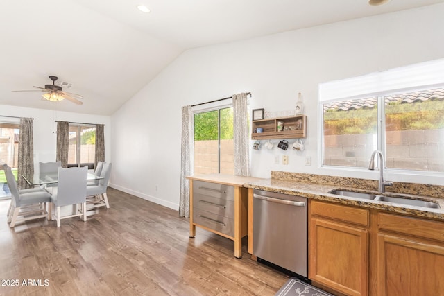 764 E Shannon St, Chandler, AZ 85225 - kitchen featuring stainless steel dishwasher, a sink, vaulted ceiling, plenty of natural light, and light stone countertops