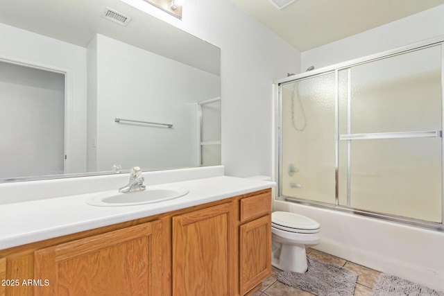 764 E Shannon St, Chandler, AZ 85225 - full bath with vanity, toilet, bath / shower combo with glass door, and tile patterned floors