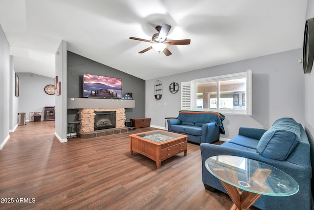 37508 N 12th St, Phoenix, AZ 85086 - living area with lofted ceiling, a ceiling fan, wood finished floors, a fireplace, and baseboards