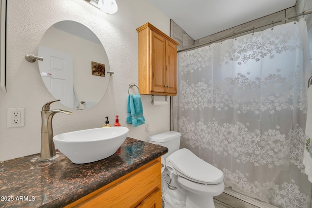 37508 N 12th St, Phoenix, AZ 85086 - bathroom with toilet, vanity, and curtained shower