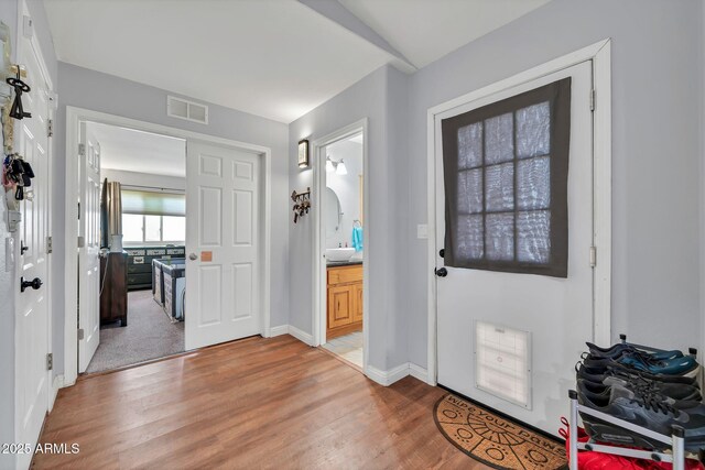 37508 N 12th St, Phoenix, AZ 85086 - entrance foyer with light wood-style floors and baseboards