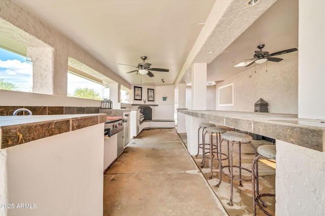 37508 N 12th St, Phoenix, AZ 85086 - view of patio with ceiling fan and exterior kitchen
