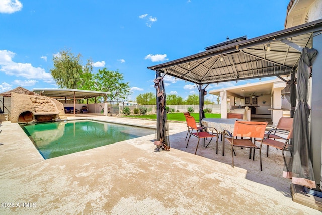 37508 N 12th St, Phoenix, AZ 85086 - view of swimming pool featuring a gazebo, a patio area, a fenced backyard, and outdoor dining space