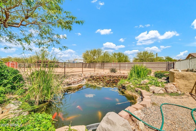 37508 N 12th St, Phoenix, AZ 85086 - view of pool with a small pond and fence